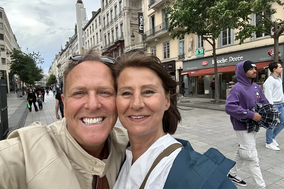 Eric with a friend in the centre of Lyon in 2024.