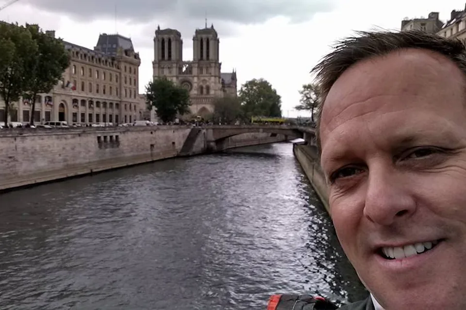 Eric in front of Notre-Dame in Paris.